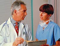Picture of a doctor and nurse reviewing a patient's chart